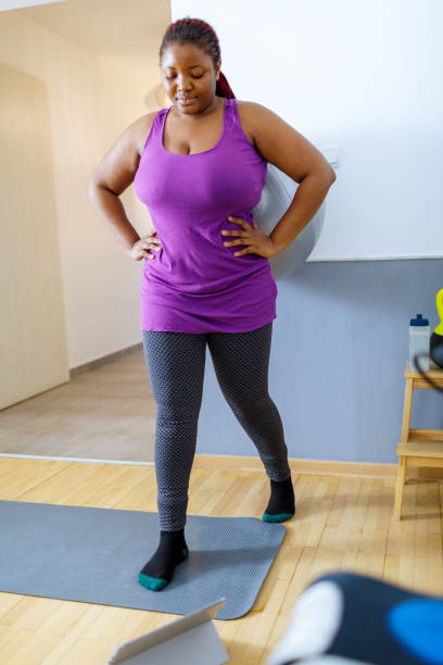 istock African Woman Exercising At Home 1461327366