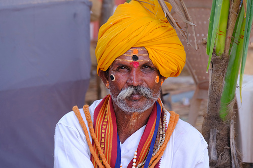 28 January 2023, Pune, India, Varkari man portrait with traditional face along with turban, tulsi mala in Indrayani Thadi Jatra, Pune, Maharashtra, India. varkari pandharpur, pilgrimage, dhoti.