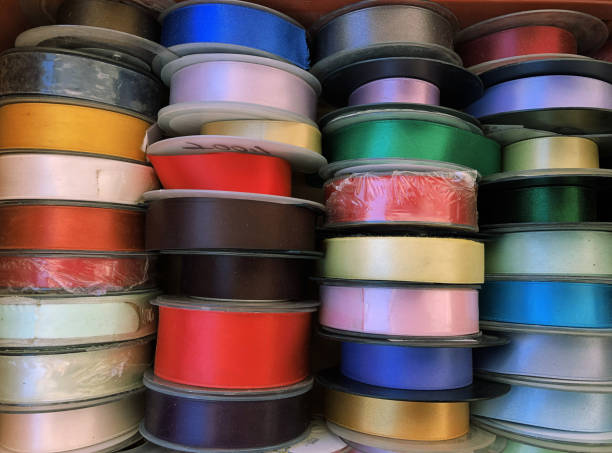 istock Colorful rolled ribbons for sale full frame 1461332515