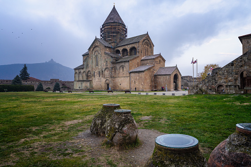 Wide angle view from winesellar to Svetitskhoveli Cathedral in Mtskheta in winter. Georgia