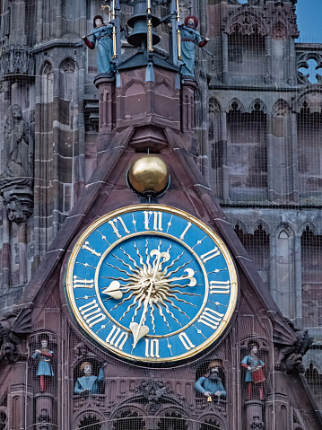 Close-up of clock Mannleinlaufen at Nuremberg Church of Our Lady, Germany.