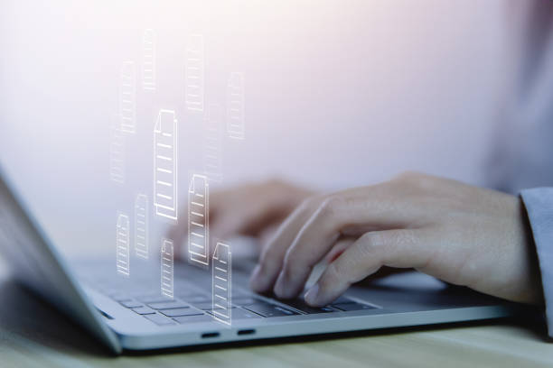 istock business people use laptops electronic document management paperless office 1461336146