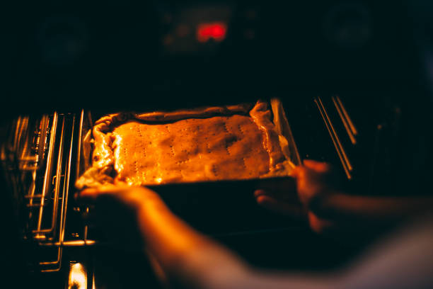istock Warm light cheese cake in the oven 1461338034