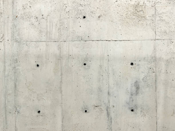 istock Concrete wall background with drilled holes. 1461340565