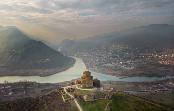 aerial view at jvari monastery with mtskheta town on background. georgia - mtskheta imagens e fotografias de stock