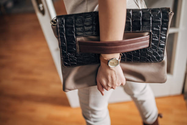 istock Woman carrying modern leather purse 1461342970