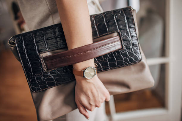 istock Woman carrying modern leather purse 1461343490