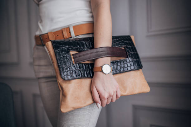 istock Woman carrying modern leather purse 1461343751