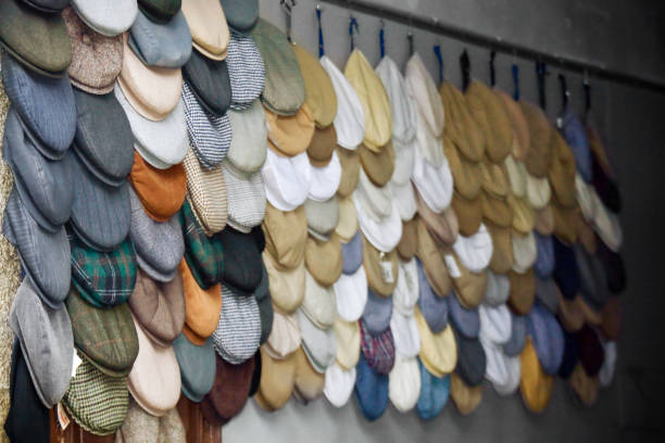 Caps retail display, town store in Betanzos, Galicia, Spain.