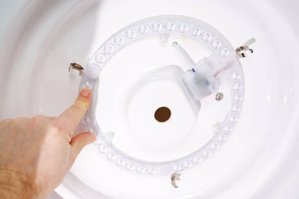 istock installation of ring LED module. concept of modern lighting. 1461354454