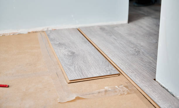 istock Laminate planks on the floor in apartment under renovation. 1461356716