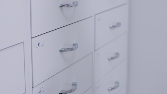 White drawers in the pharmacy room