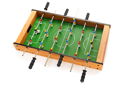 Table football game isolated over white background