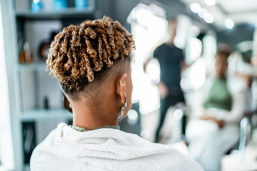 Woman's hair styled at a hair salon