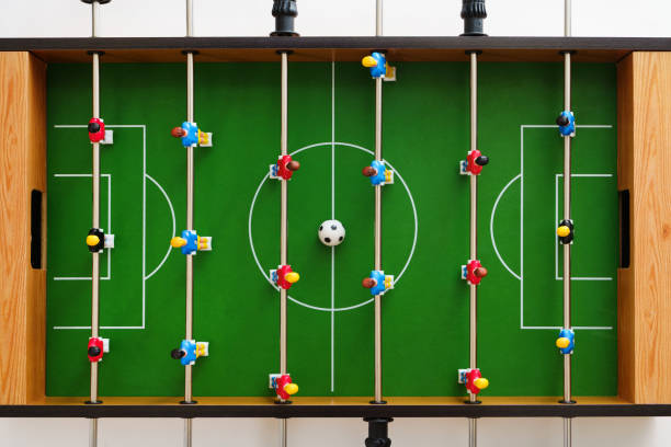 istock Top view of a table football game in progress 1461363202