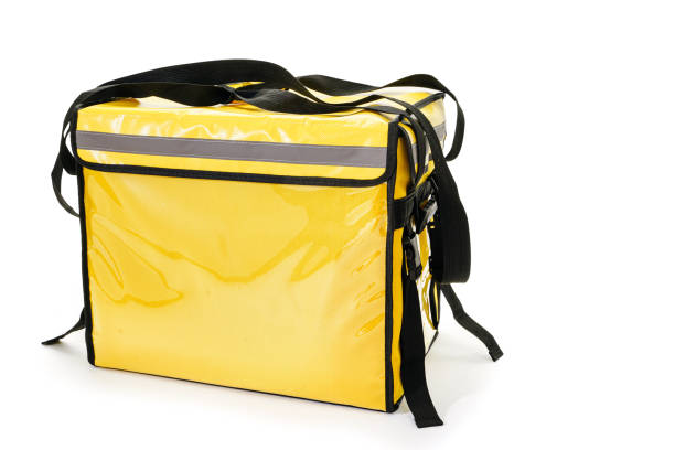 istock Yellow thermal bag for delivery isolated on white background 1461363675