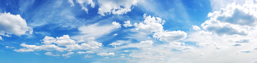 Panoramic view of the sky with beautiful cloudscape in sunny day. Simplicity in nature.