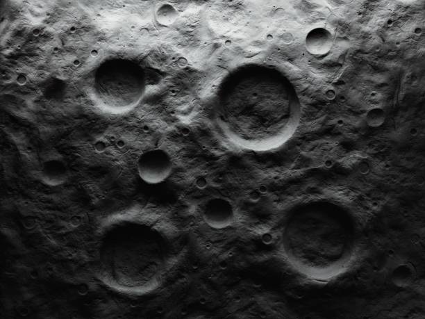 istock Lunar surface with large craters. Relief of the Moon. 1461365176