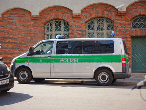 Munich, Germany - August 5, 2022 : german police car van. Police Germany terror attack editorial illustrative image. ISIS, ISIL terrorist threat.