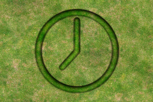 Clock Symbol Shape Made From Grass