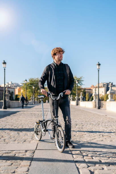 istock Young Man Using Bike Portrait 1461369800