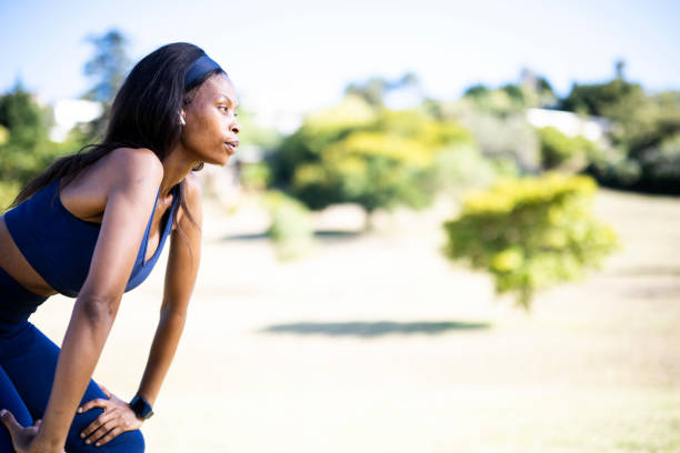 istock Side view woman exhaling resting sweating from exercising 1461373142