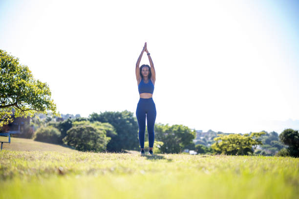 istock Front view woman stretching with arms raised 1461373250