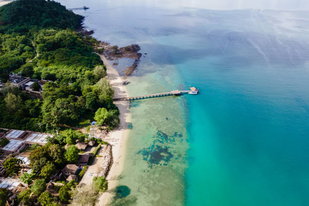 Aerial view from drone at a tropical beach in Puket Thailand Aerial view from a drone at a tropical beach in Phuket Thailand. puket stock pictures, royalty-free photos & images