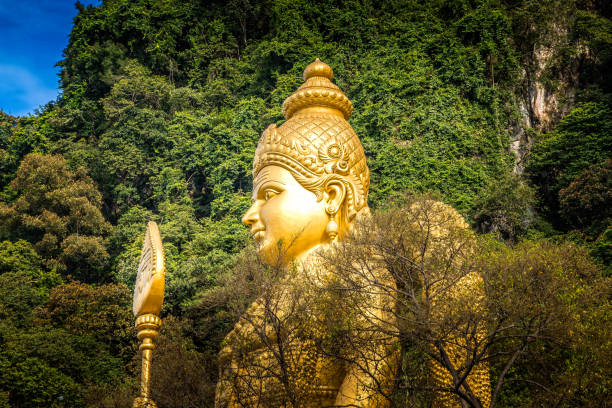The golden Buddha in front of the Batu Caves, Kuala Lu,pur, Malaysia stock photo