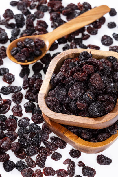 istock Healthy Food - Nuts Dehydrated Grapes; Photo White Background 1461378151