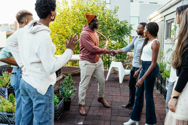 istock People knowing to each other at party 1461383357