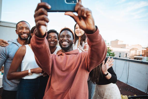 istock Group selfie at a rooftop party 1461386660