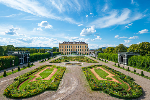 Vienna, WIEN, Austria - August 22, 2023: Belvedere Castle and little lake and flowers