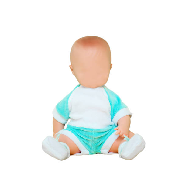 istock Faceless baby doll with empty plastic face isolated on white background. 1461394158