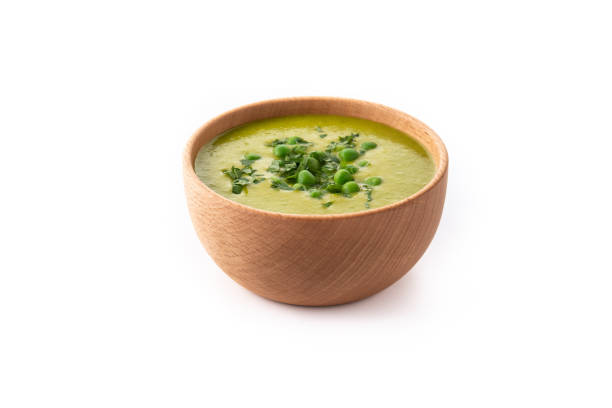 суп из зеленого горошка в миске - vegan pea soup стоковые фото и изображения