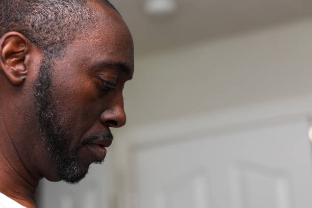 istock A portrait of a black man praying 1461402669