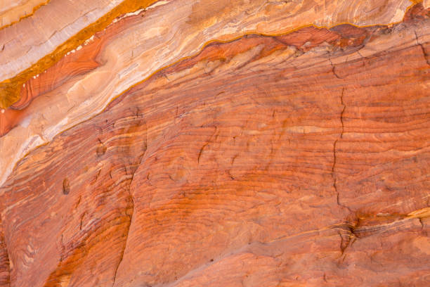 istock Sandstone rock and mineral layers in Petra, Jordan 1461405365