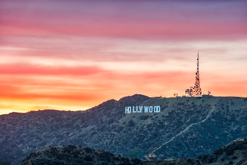 Landscape with Mount Lee and the Hollywood Sign in Los Angeles, California, USA at sunset.