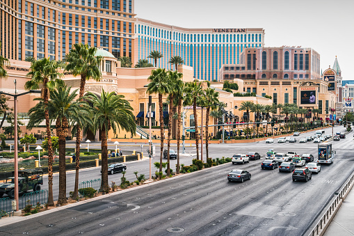 Cars stand at an intersection on The Strip, Las Vegas Boulevard in Las Vegas, Nevada, USA on a cloudy day.