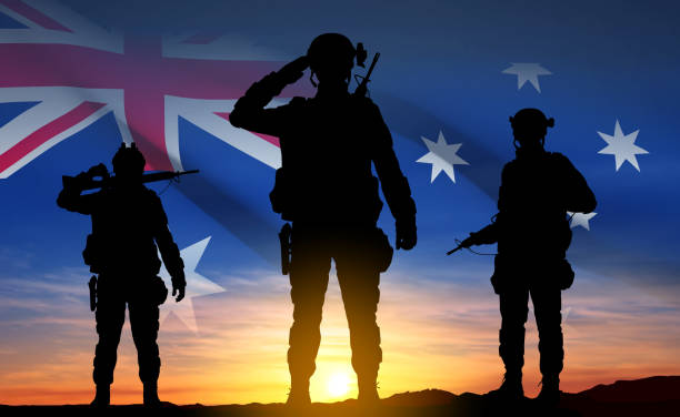 istock Silhouette of Soldiers with Australian flag 1461413565