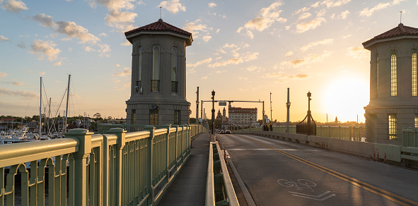 Bridge of Lions and the marina of Saint Augustine, Florida, in the late evening on sunset.
