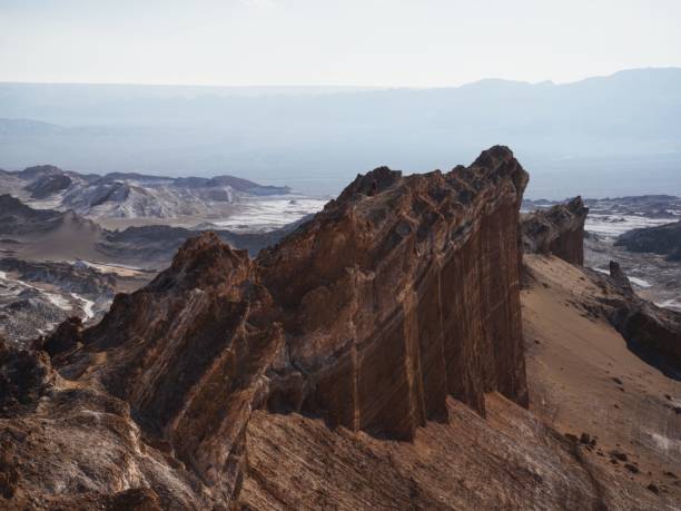 Landscape panorama view of rock formations in Valley of the moon Valle de la luna near San Pedro de Atacama desert Chile stock photo