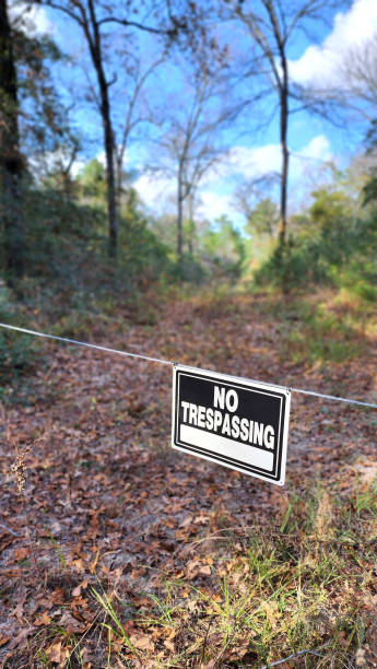istock No trespassing sign in rural area. 1461423402