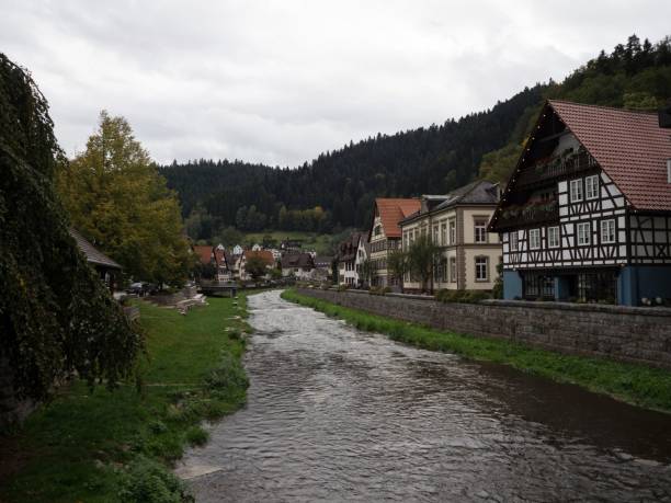 istock Old historic typical traditional half-timbered house building at Kinzig river in Schiltach Rottweil Black Forest Germany 1461425210