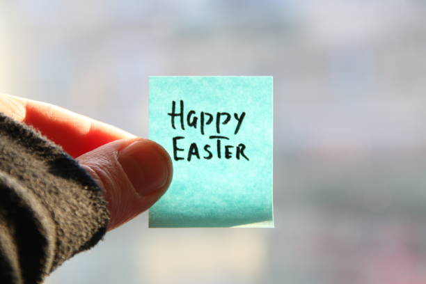 istock Happy Easter! The inscription on the blue tag. 1461428249