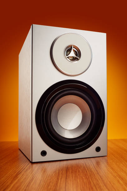 Audio music sound speaker on orange background