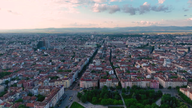Wide drone shot of National Palace of culture, Sofia, Bulgaria. Aerial view of Sofia downtown area, fountains and water