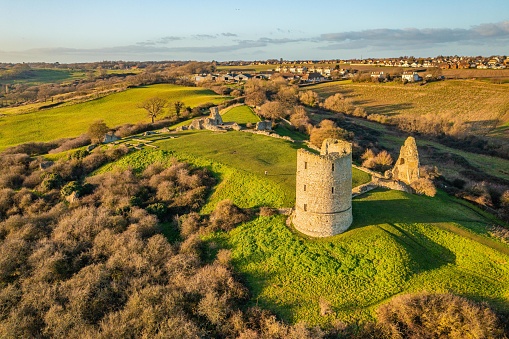 Aerial photo from a drone of Hadleigh Castle, The romantic ruins of a royal castle overlooking the Essex marshes in Benfleet, UK. Captured in January 2023.