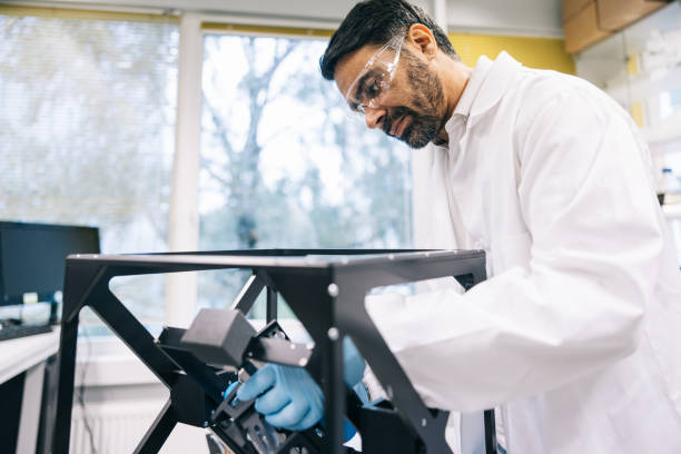 istock Indian scientist is focused on perfecting a prototype in a well-equipped laboratory 1461437690