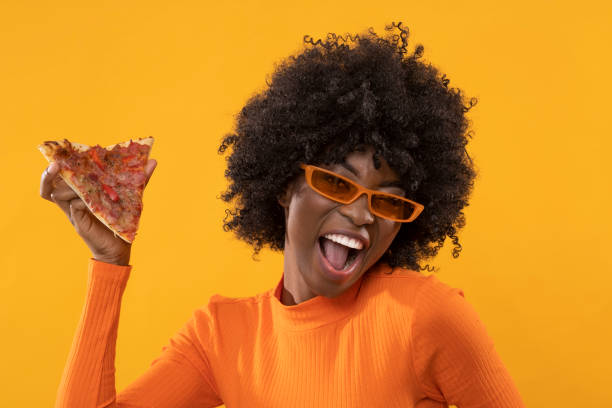 istock This woman is true pizza lover. 1461439995